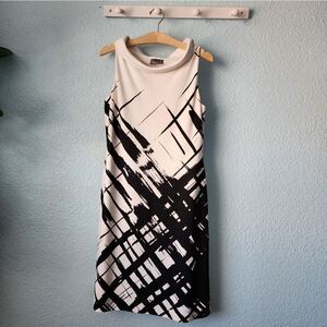 Muse femcore minimalist chic midi sleeveless dress